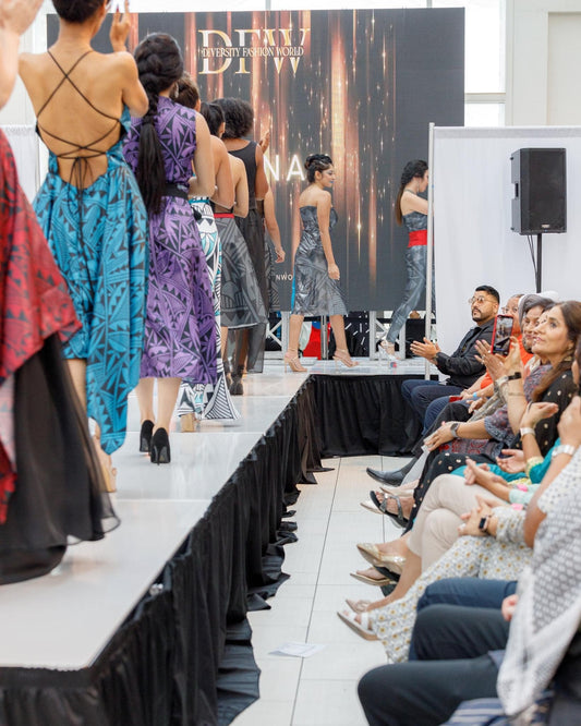 Models wearing designs from Native American Designer, ACONAV, at Diversity Fashion World fashion show on September 2022